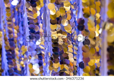 Sequins make up a nice material for a photobooth backdrop at a wedding reception in Oregon.