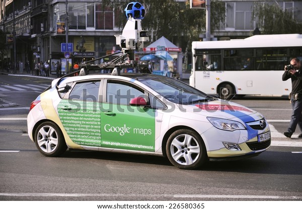 SERBIA, BELGRADE - OCTOBER 25, 2013: A Google\
Street View vehicle used for mapping streets throughout the world\
drives through the city center of Belgrade. Google Street View\
started in May 2007.