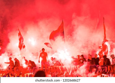 SERBIA, BELGRADE - September 23, 2018: Football Fans With Torches During The Eternal Rivals Have Met In The Eternal Soccer Derby, FC Partizan And Red Star, Was Played On 23 September In Belgrade