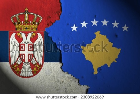 Serbia flag and Kosovo flag painting on wall. Serbia vs Kosovo