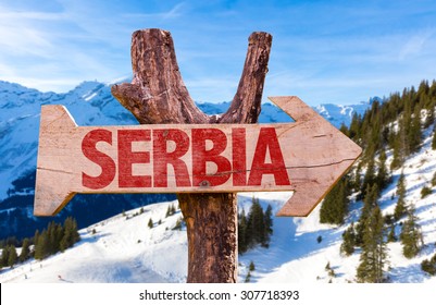 Serbia Wooden Sign With Winter Background
