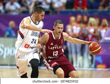 Serbia's national team defeated Latvia 92--82 at the 1 September 2017 Istanbul Fiba Eurobasket 2017 Men's Basketball Championship (L) Stefan Jovic, Janis Strelnieks