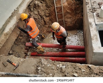 Serdang, Selangor, Malaysia: December 02, 2020: Installation of PVC pipe for electrical underground cable