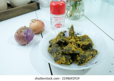 SEremban, Malaysia; Sept 2022_-Malaysian Spicy Paru Balado In White Plate Close-Up With Chili Sambal South East Asian Traditional Food