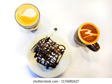 SEREMBAN,MALAYSIA - SEPT 04, 2018: Coffee Drink And Chocolate Cake At McCafe. McCafe Is A Coffee House Style Food And Drink Chain, Owned By McDonald's