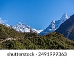 
In the serene ambiance of Dingboche, travelers revel in the breathtaking views of Amadablam and Nuptse Shar. The Peace Stupa offers a tranquil sanctuary amidst this Himalayan spectacle, where awe-ins