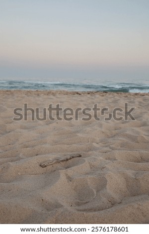 Similar – Image, Stock Photo Sunset reflections at Praia Emilia’s rocky beach