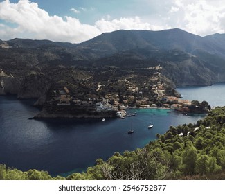 A serene coastal village nestled on a small peninsula surrounded by clear blue waters. The picturesque settlement has charming houses and boats. The surrounding landscape includes cliffs and hills.  - Powered by Shutterstock