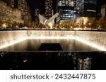 Serene Evening View of the 9 11 Memorial Pools With Oculus Structure in Background
