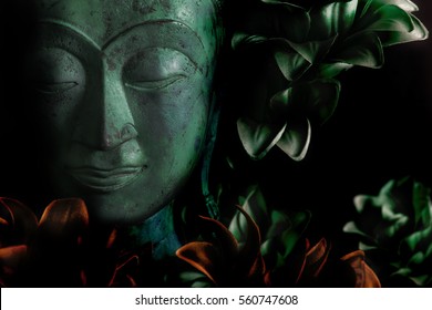 The Serene Face Of Buddha In Peaceful Meditation. Many Connotations Of Spiritual Enlightenment. Peace, Love And Zen.