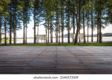 Serene Lakeside View Framed by Tall Trees and Draped Fabric   - Powered by Shutterstock