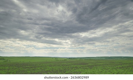 A Serene Landscape Featuring Stunning and Dramatic Cloudy Skies That Captivate the Eye Time lapse.