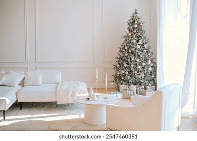 A serene living room features a white Christmas tree adorned with ornaments, alongside a chic sofa and stylish decor. Soft sunlight streams through large windows, enhancing the cozy atmosphere. - Powered by Shutterstock