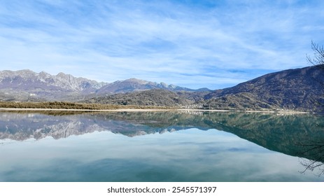 Serene mountain landscape with a clear lake reflecting the sky, ideal for concepts of tranquility and nature escapes Dolomite Alps, Dolomites - Powered by Shutterstock