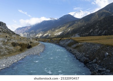 A serene mountain river flowing through a scenic valley - Powered by Shutterstock