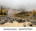 Serene natural beauty abounds at Upper Twin Lake, where rugged rock formations rise from a tranquil lake