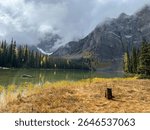 Serene natural beauty abounds at Upper Twin Lake, where rugged rock formations rise from a tranquil lake