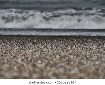 A Serene Pebbled Beach Landscape illuminated by a bright beautiful setting sun. - Powered by Shutterstock