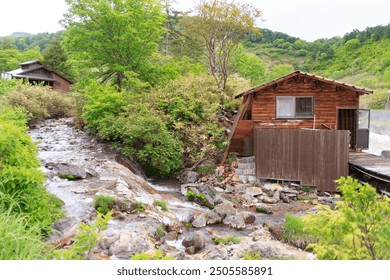 Serene Riverside Cabin with Cascading Stream, Tamagawa Onsen, Akita, Japan - Powered by Shutterstock