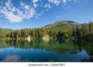 Serene Scene By The Mountain Lake In Canada