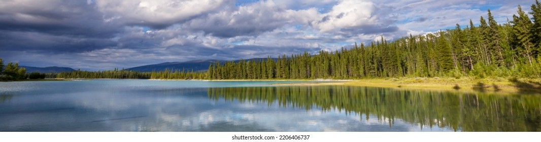 Serene Scene By The Mountain Lake In Canada