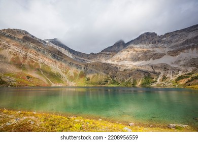 Serene Scene By The Mountain Lake In Canada