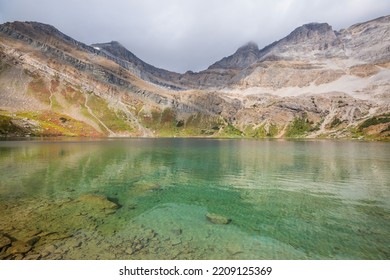 Serene Scene By The Mountain Lake In Canada