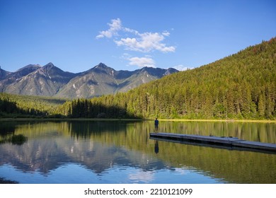 Serene Scene By The Mountain Lake In Canada