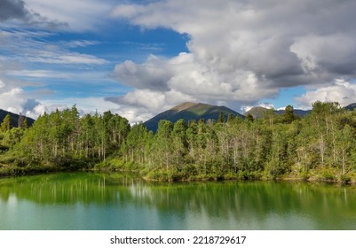 Serene Scene By The Mountain Lake In Canada