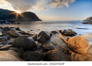 Serene Sunrise Over Rocky Seashore Landscape - Powered by Shutterstock