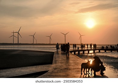 Serene sunset over the Gaomei Wetlands in Taichung, peaceful marshes and distant horizon create a tranquil scene. - Powered by Shutterstock