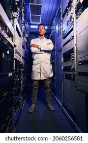 Serene IT Technician Standing Alone In Server Room