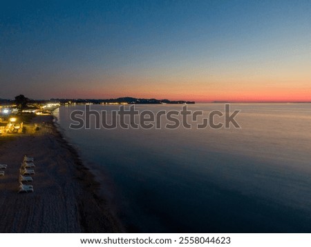 Similar – Image, Stock Photo Serene twilight seascape with pastel reflections