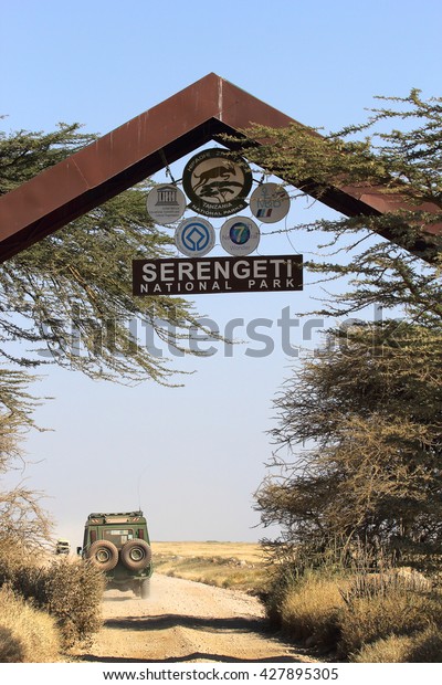 SERENGETI NATIONAL PARK, TANZANIA - JUNE 08:\
Entrance gate to the Serengeti National Park on June 08, 2013 in\
Serengeti National Park. Serengeti hosts the world largest\
terrestrial mammal\
migration