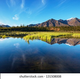 Serenity Lake In Tundra On Alaska