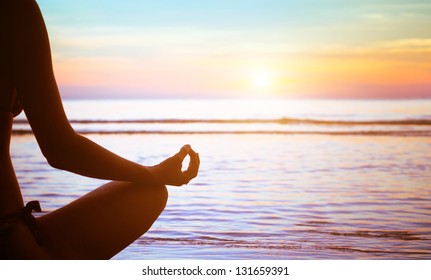 serenity and yoga practicing at sunset, meditation