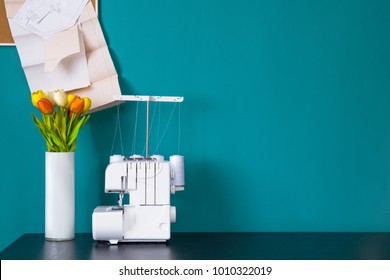 The Serger On Table In Workshop.