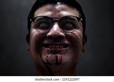 Serial Killer Maniac On Dark Background