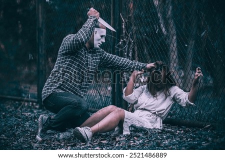 A serial killer scene is about to kill an Asian woman,concept thriller scene,Halloween festival