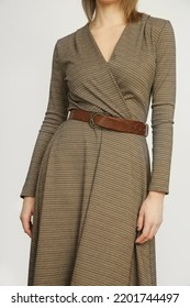Serie Of Studio Photos Of Young Female Model In Brown Tweed Dress, Autumn Winter Fashion Collection.