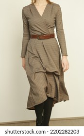 Serie Of Studio Photos Of Young Female Model In Brown Tweed Dress, Autumn Winter Fashion Collection.