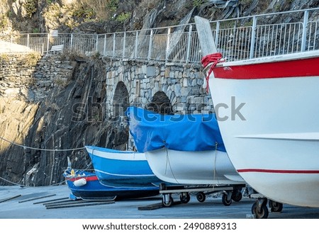 Similar – Image, Stock Photo Manarola is one of the most beautiful villages in Italy. The Cinque Terre is a rugged coastline of the Ligurian Riviera and is made up of five beautiful hilltop villages.