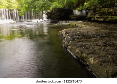 A Series Of Small Waterfalls In A Forest.  Old Stone Fort State Archaeological Park, Manchester, TN, USA.