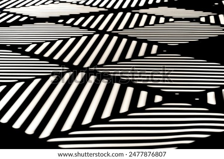 A series of white horizontal lines create a a crisscross interference pattern, could be interpreted as an optical illusion or a modern abstract art, making it interesting due to its visual complexity.