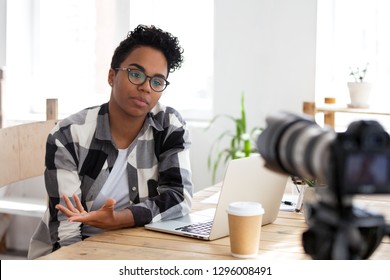 Serious African Girl Blogger Vlogger Talking To Camera Shooting Educational Video Filming Webinar Blog, Black Female Business Coach Teacher Speaking Recording Vlog Training Or Job Interview