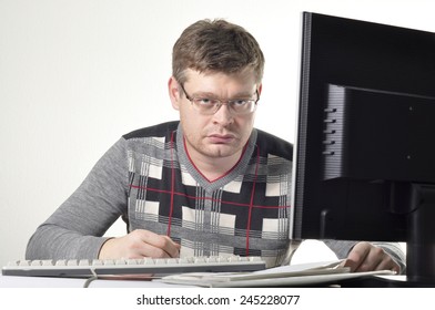 Serious Angry Man At The Computer