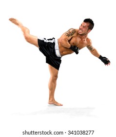 Serious Asian man with short black hair in athletic costume kicking - Isolated