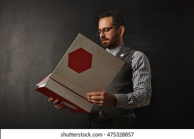 Serious Bearded Professor In Plaid Oxford Shirt And Tweed Vest Reads New Educational Plan For His Student For Next Year In University