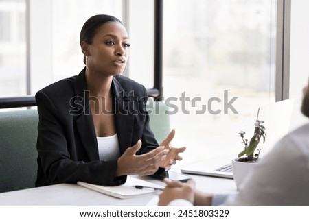 Similar – Image, Stock Photo Confident black woman in front of rustic stone backdrop