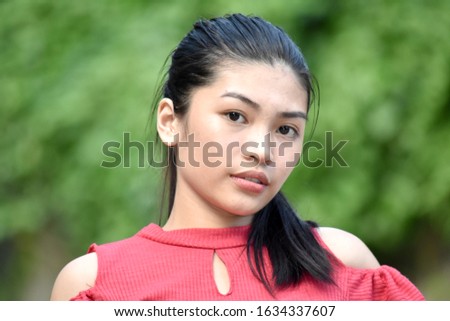 A Serious Beautiful Filipina Female Juvenile